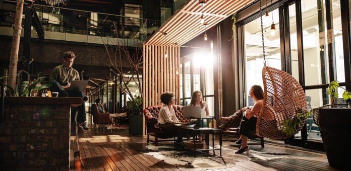 Wide,Angle,Shot,Of,Business,People,In,Modern,Office.,Young retail